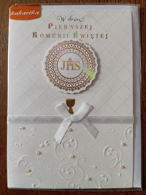 Pamiątka Pierwszej Komunii Świętej nowa zafoliowana z kopert