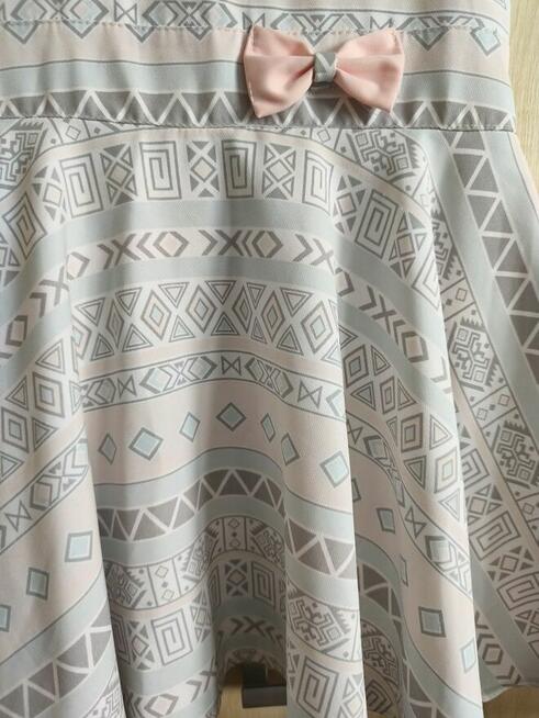 Nowa elegancka sukienka 146 na uroczystości rodzinne