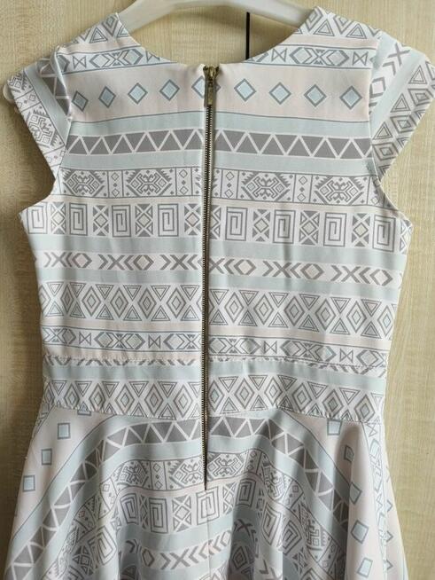 Nowa elegancka sukienka 146 na uroczystości rodzinne