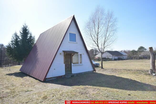 B ładna działka z domkiem letniskowym, własny las.