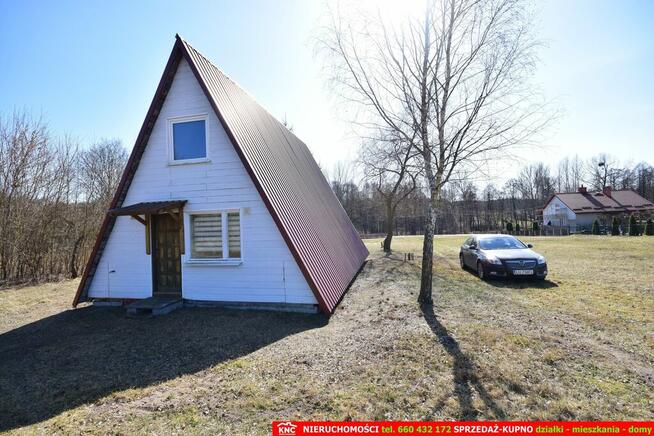 B ładna działka z domkiem letniskowym, własny las.