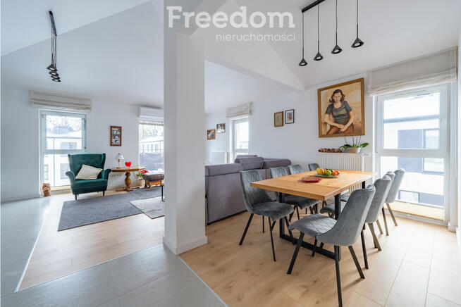 Loftowa przestrzeń z 2 miejscami postojowymi