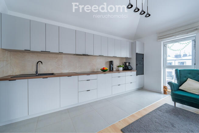 Loftowa przestrzeń z 2 miejscami postojowymi