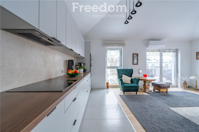 Loftowa przestrzeń z 2 miejscami postojowymi