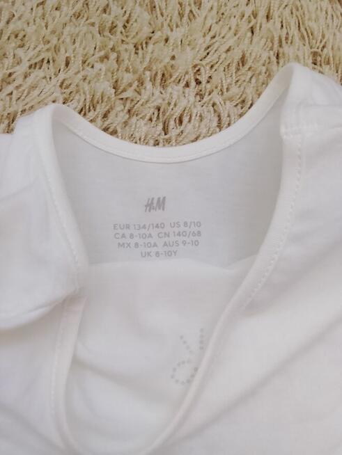 Sukienki dla dziewczynki rozm. 128/134