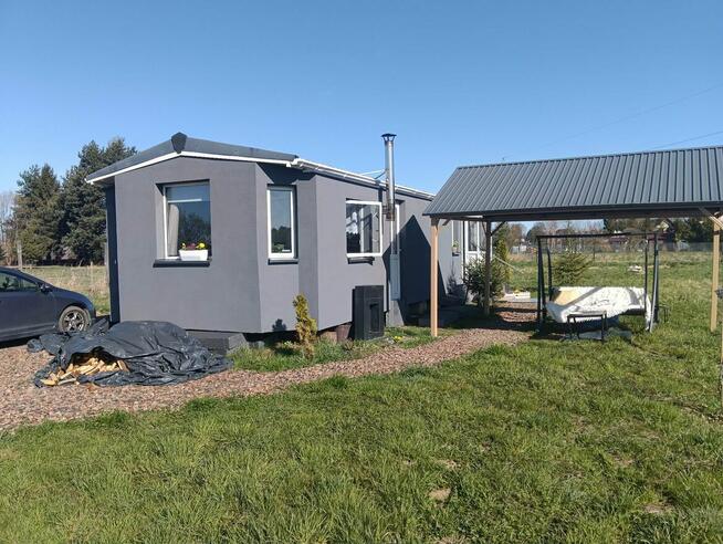 Sprzedam działkę widokową z domkiem całorocznym .