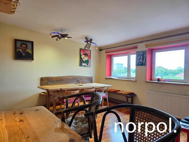 Stylowe mieszkanie w kamienicy przy Młynówce Królewskiej, ponad dachami innych