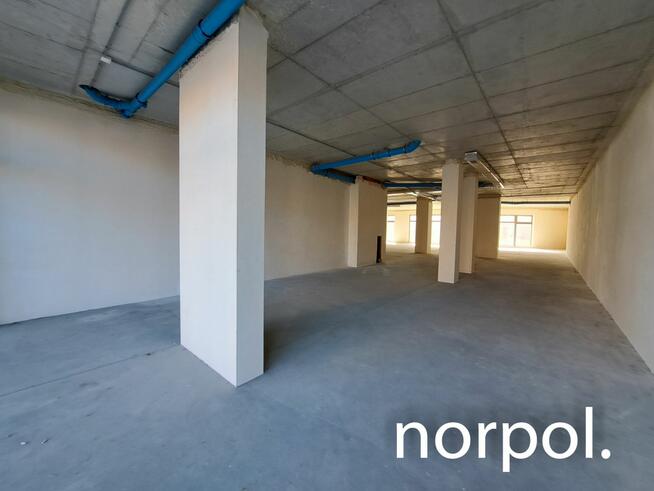 Lokal usługowo-handlowo-biurowy w reprezentacyjnym apartamentowcu, os. Ruczaj