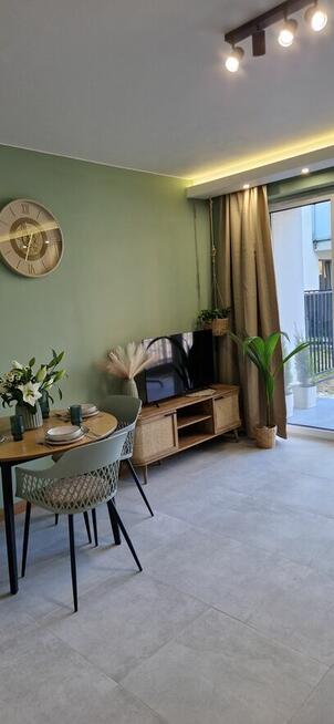 Mieszkanie na 1szym piętrze z dużym zielonym tarasem