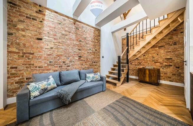 Dwupoziomowe loftowe mieszkanie kamienica Jeżyce