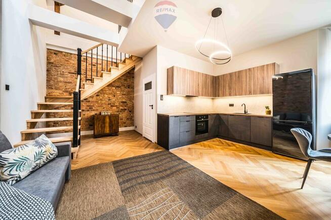 Dwupoziomowe loftowe mieszkanie kamienica Jeżyce