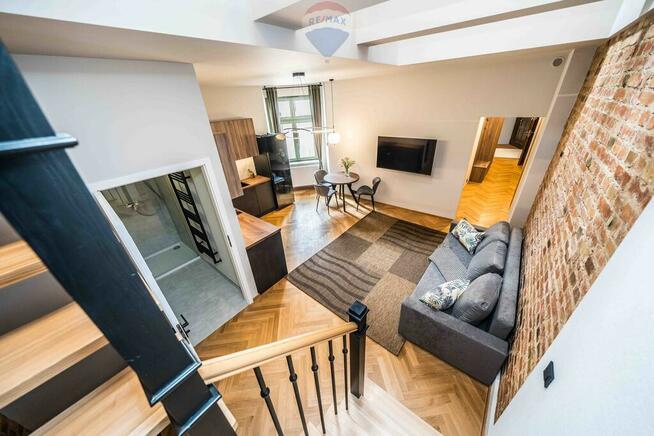 Dwupoziomowe loftowe mieszkanie kamienica Jeżyce