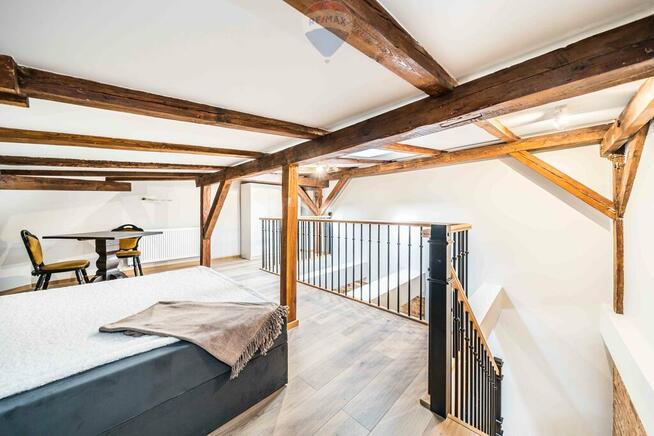 Dwupoziomowe loftowe mieszkanie kamienica Jeżyce