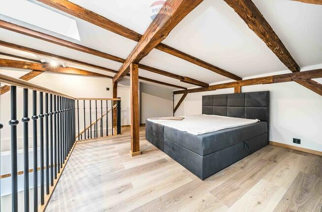 Dwupoziomowe loftowe mieszkanie kamienica Jeżyce