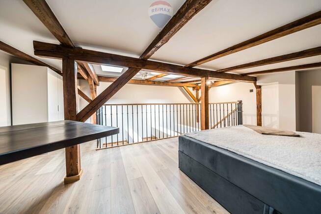 Dwupoziomowe loftowe mieszkanie kamienica Jeżyce