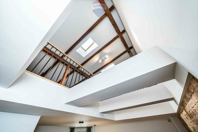 Dwupoziomowe loftowe mieszkanie kamienica Jeżyce