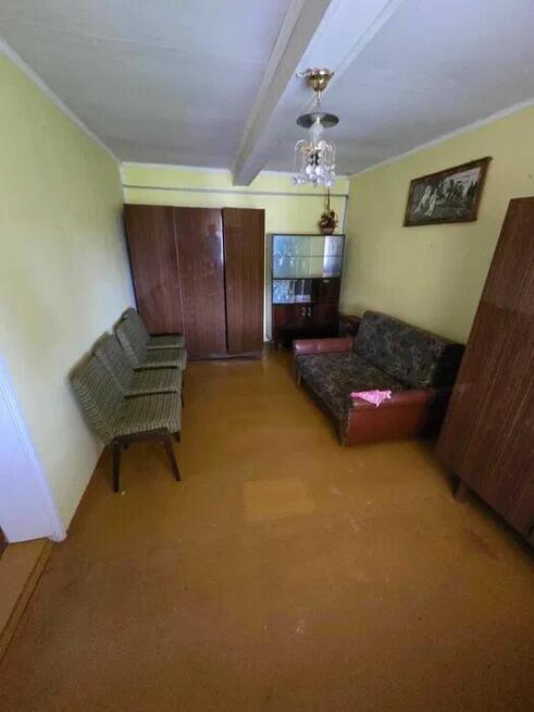 Sprzedam dom drewniano-murowany 60m2, działka 23,59a.