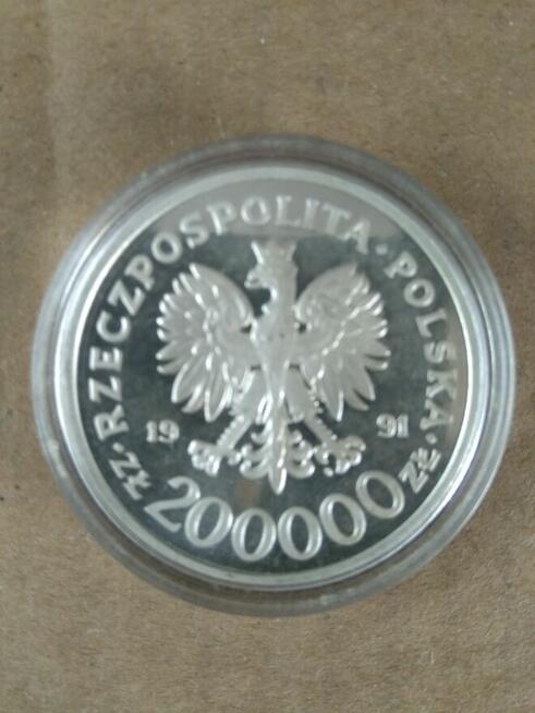 62. Moneta okolicznościowa 200000 zł.