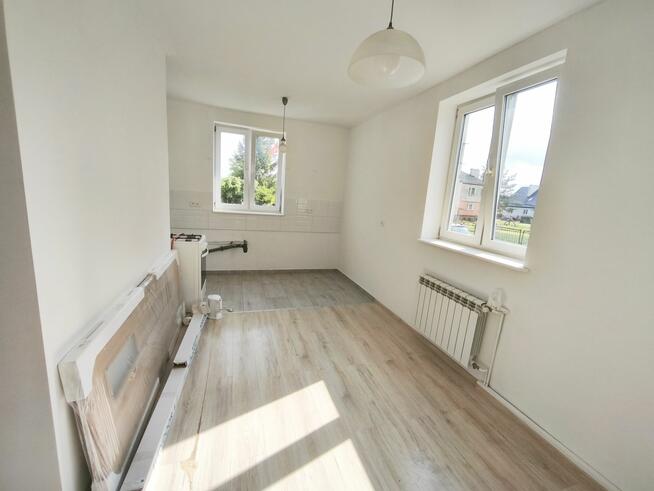 nad jeziorem z ogródkiem i garażem