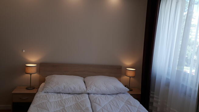 Apartament w butikowym apartamentowcu blisko centrum