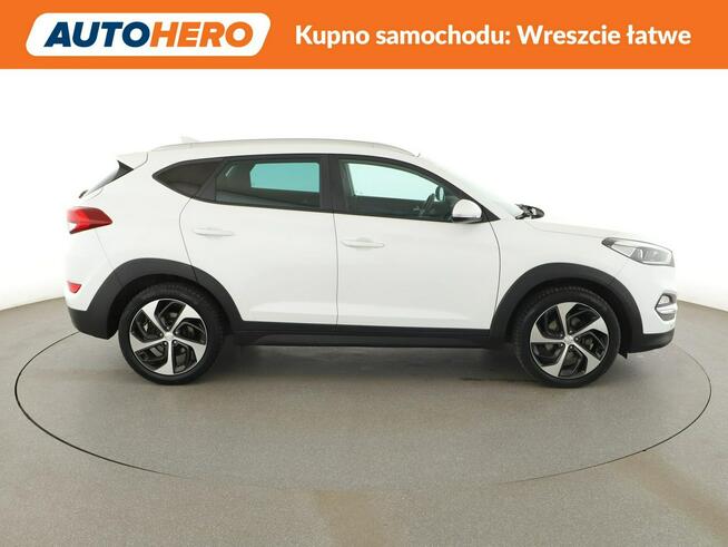 Hyundai Tucson automat 4x4 navi klima auto grzane fotele kamera i czujniki parkowania