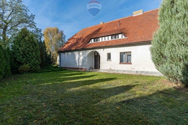 Działka zabudowana starą szkołą|jez.Niepruszewskie