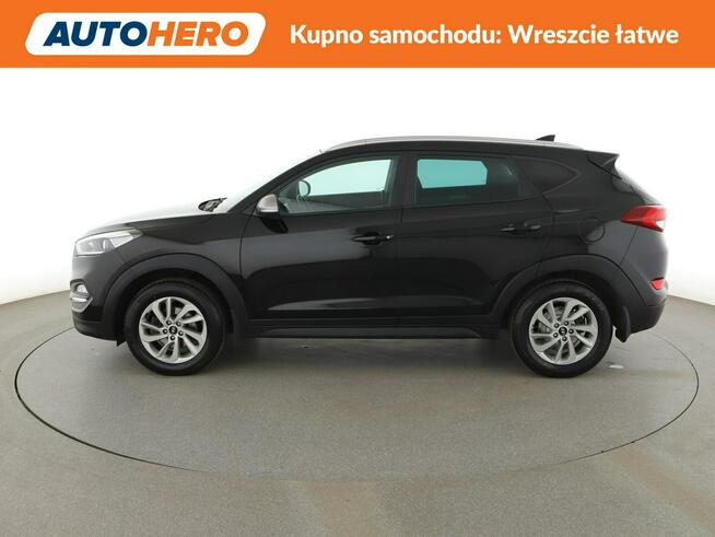 Hyundai Tucson klima auto navi grzane fotele kamera i czujniki parkowania hak