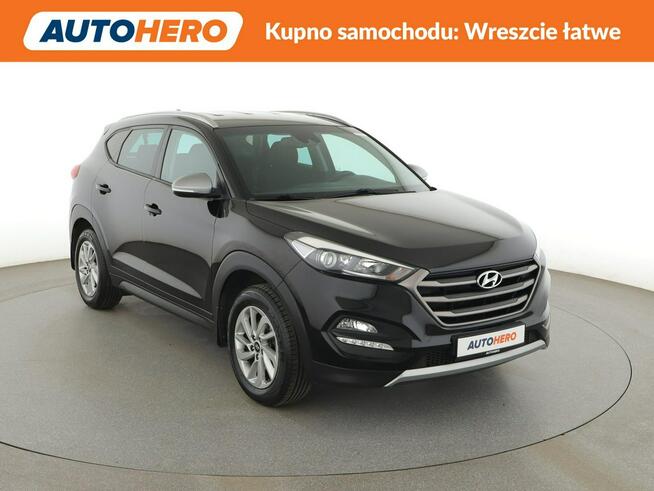 Hyundai Tucson klima auto navi grzane fotele kamera i czujniki parkowania hak