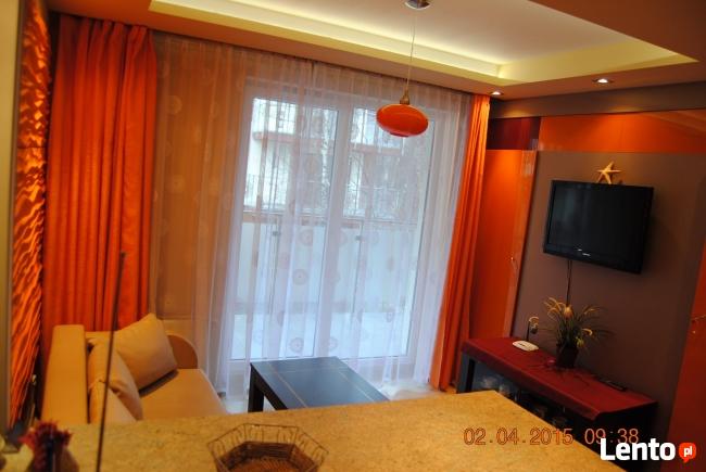 Apartament LUX pomarańczowy z basenem, sauną, siłownią,