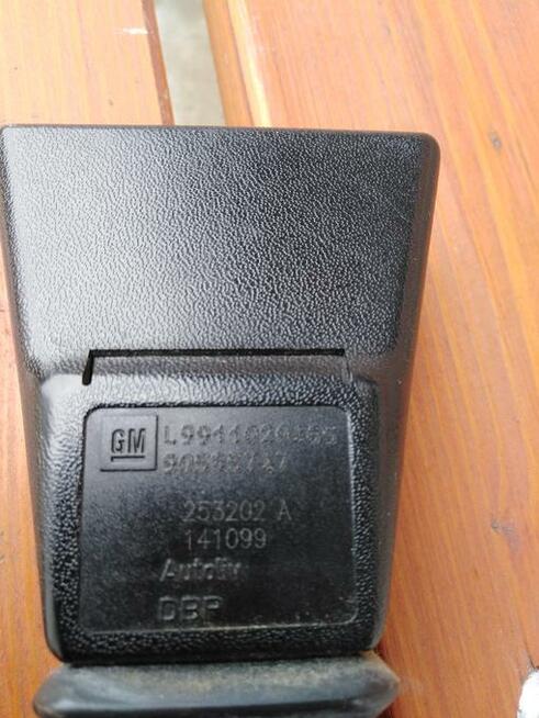 NAPINACZ PASA LEWY PRZÓD OPEL VECTRA B LIFT 90585747