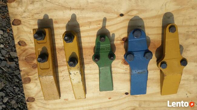 Zęby przykręcane do chwytaków.