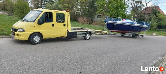 TANIA Pomoc drogowa Olsztyn 24 laweta 7 osób auto lawetanie