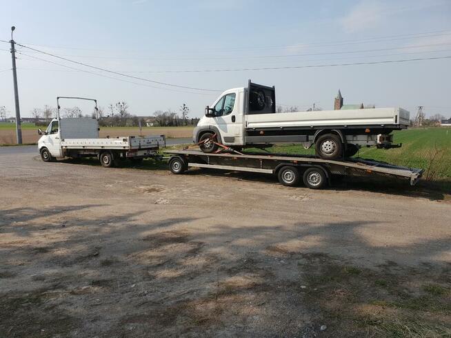 TRANSPORT MASZYN ROLNICZYCH OPRYSKIWACZY PRZYCZEP stali