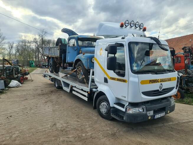 TRANSPORT MASZYN ROLNICZYCH OPRYSKIWACZY PRZYCZEP stali