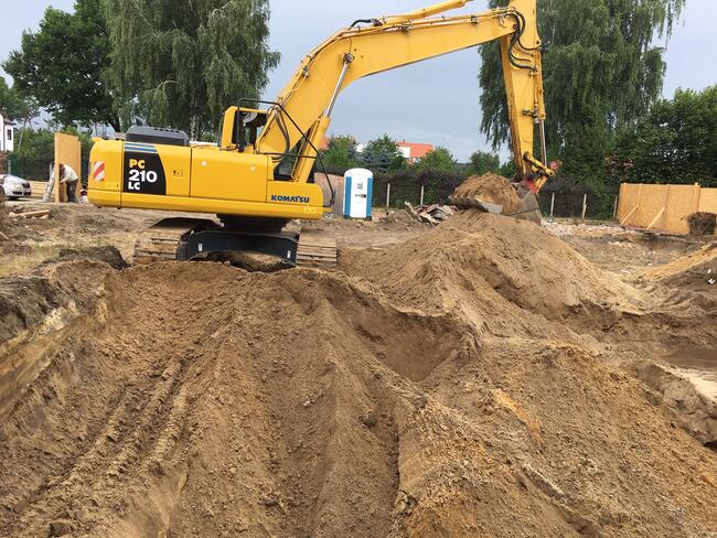 Wykopy rozbiórki roboty ziemne kopanie stawów koparka gąsien