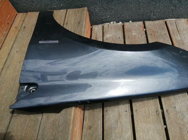 Kraków Błotnik przedni przód Laguna III 3 lift lewy 2012r