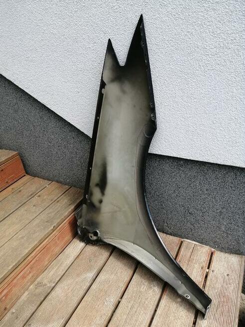 Kraków Błotnik przedni przód Laguna III 3 lift lewy 2012r