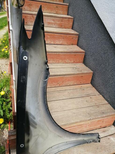 Kraków Błotnik przedni przód Laguna III 3 lift lewy 2012r