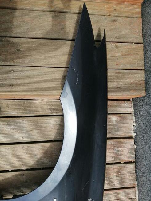 Kraków Błotnik przedni przód Laguna III 3 lift lewy 2012r