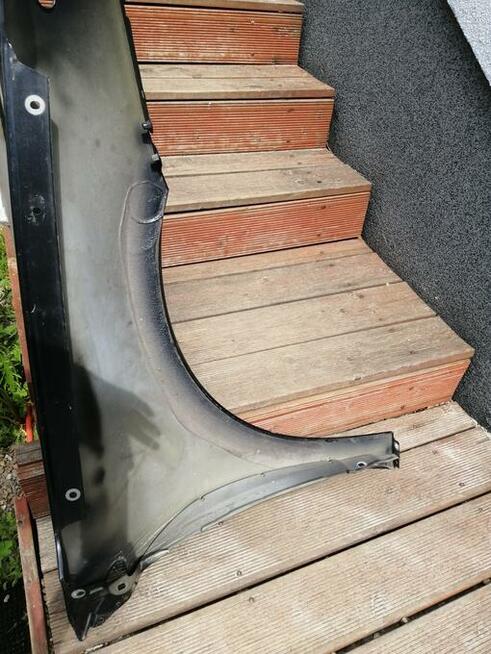 Kraków Błotnik przedni przód Laguna III 3 lift lewy 2012r