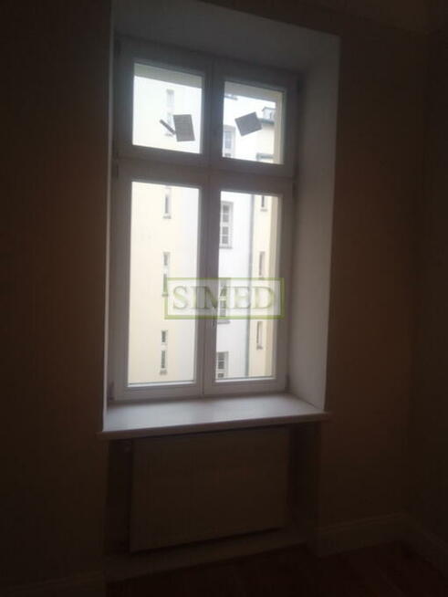 Zabytkowa kamienica komercyjna , recepcja .