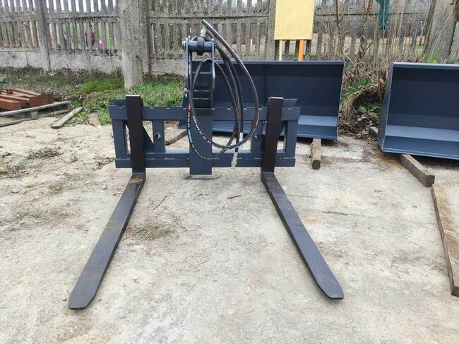 Chwytak hydrauliczny do drewna montowany na paleciak Dostawa