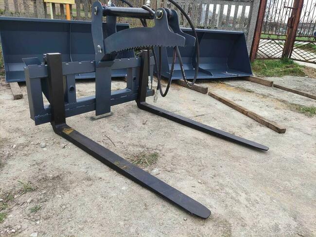 Chwytak hydrauliczny do drewna montowany na paleciak Dostawa