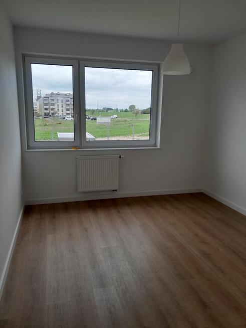 Nowe domy z ogródkami nad zalewem