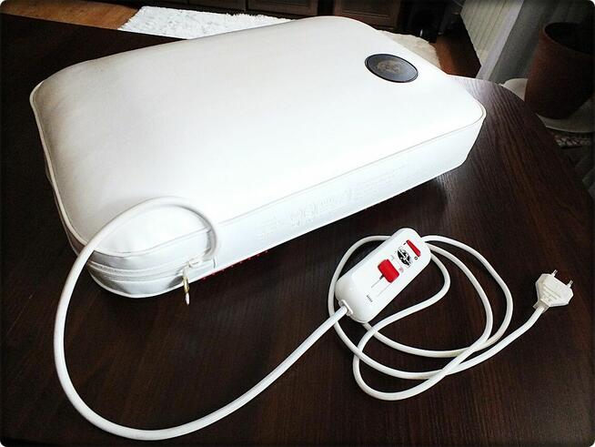 Poduszka elektryczna do masażu i rozgrzewania stóp PLANETA