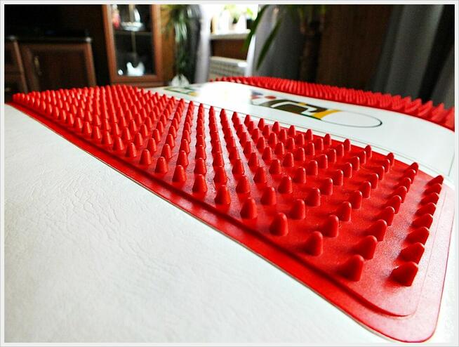 Poduszka elektryczna do masażu i rozgrzewania stóp PLANETA