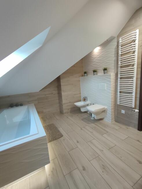 Montaż kominków, montaż drzwi i okien, wykończenia wnętrz