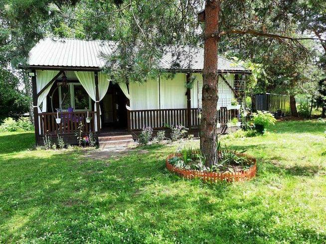 **Działka rekreacyjna, domek nad jeziorem**