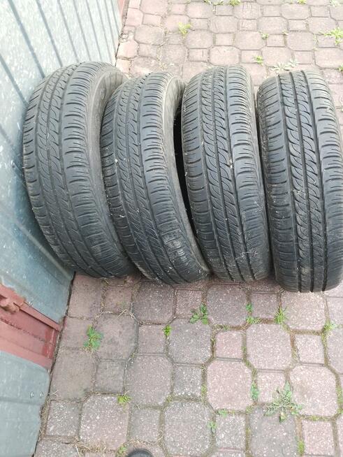 sprzedam 2 komplety opon 14 calowych