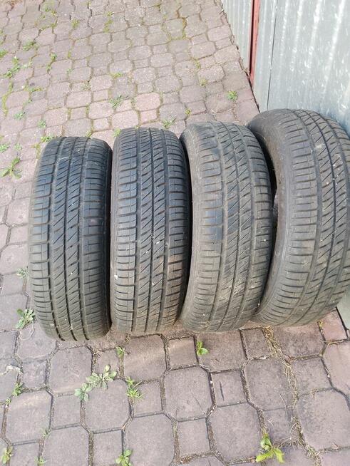 sprzedam 2 komplety opon 14 calowych